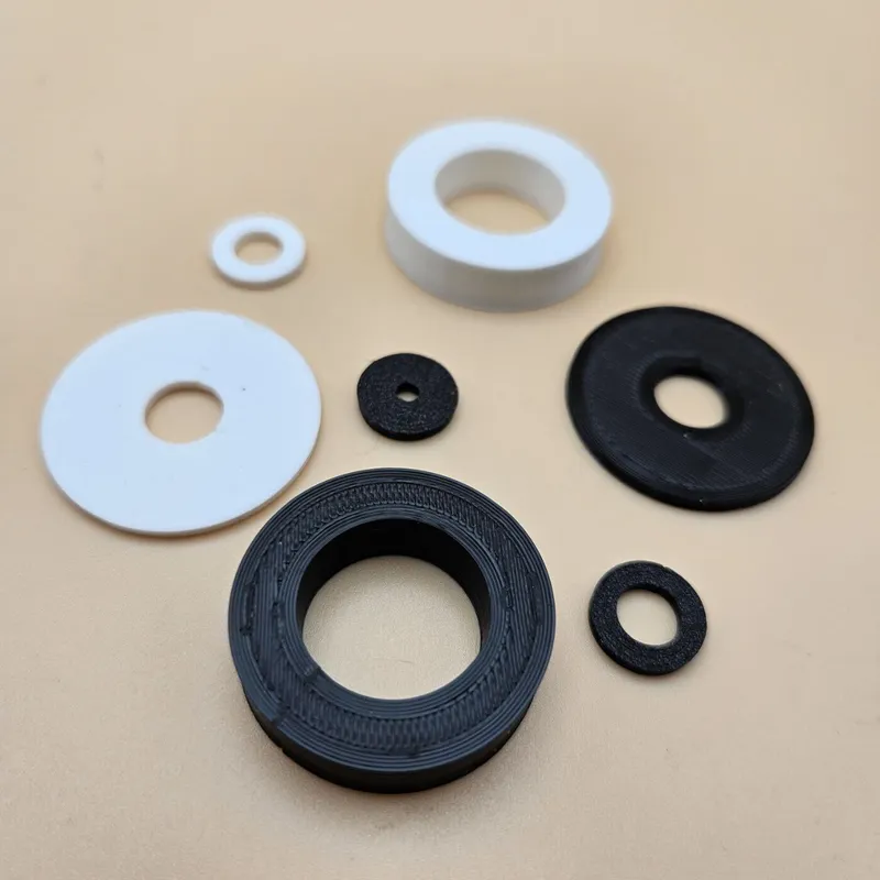 3D printed washers in black and white PLA
