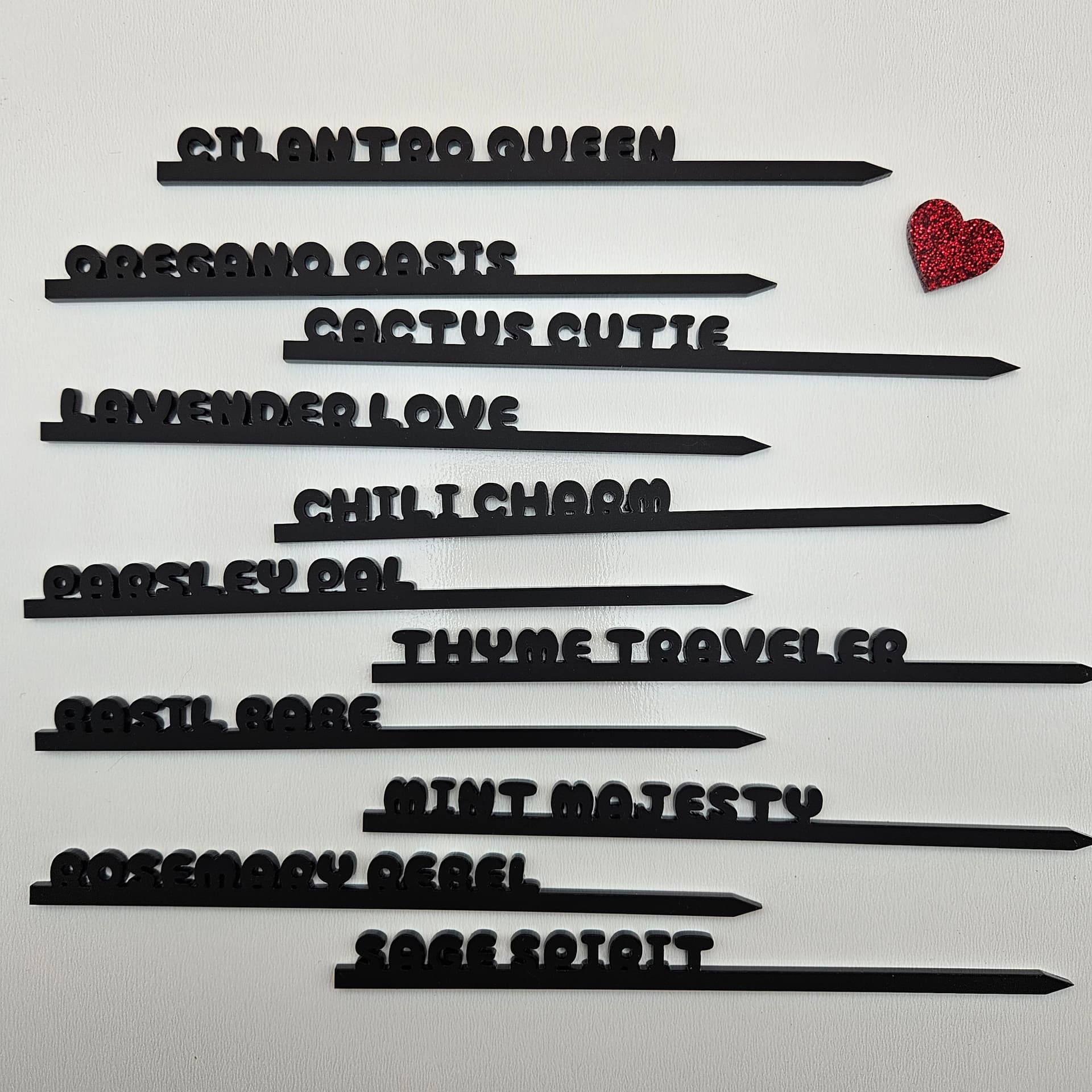 Plant stake with 'Thyme Traveler' text